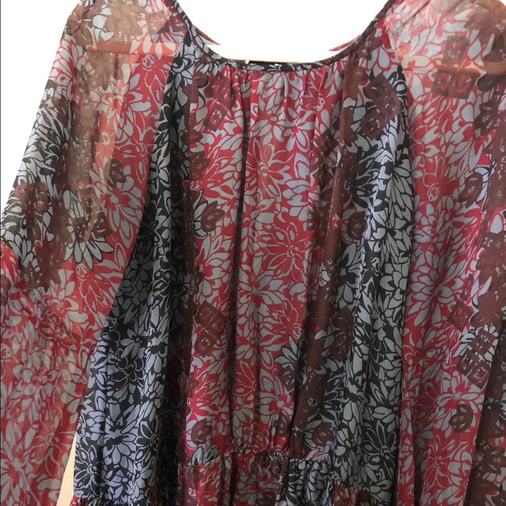 Shell 100% Silk with Polyester Inside Lining